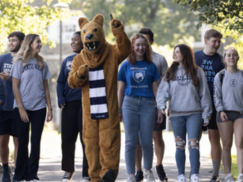 Nittany Lion mascot walking with students